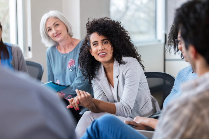facilitators guide a group in a brain health program called StrongerMemory